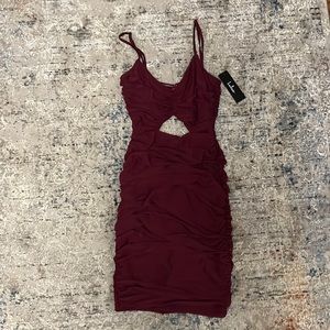 Burgundy wine colored cut out bodycon dress. NWT. XS